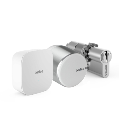 Zestaw inteligentny zamek Tedee Lock GO2 (aluminium) srebrny z białym przyciskiem + Tedee Bridge Wi-Fi + wkładka modułowa SLR 30-61/37-68 mm z zębatką (typ D) 