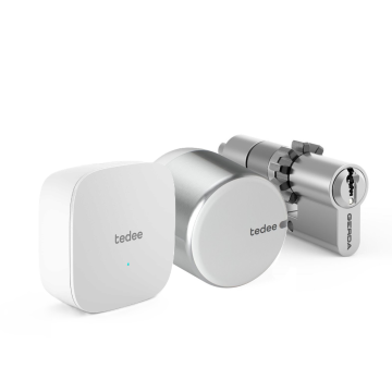 Zestaw inteligentny zamek Tedee Lock GO2 (aluminium) srebrny z białym przyciskiem + Tedee Bridge Wi-Fi + wkładka modułowa SLR 30-61/37-68 mm z zębatką (typ D) 